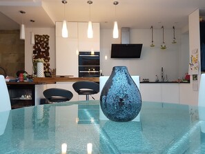 Round dinning table and kitchen