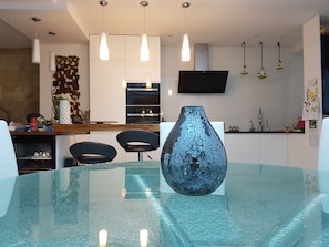 Round dinning table and kitchen