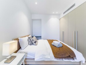 queen bedroom with wardrobe