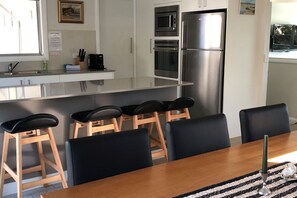 Dining kitchen with large island bench