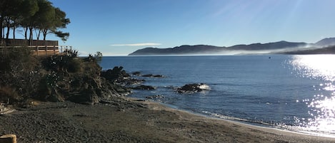 La Farella Beach looking towards El Port de la Selva and Cap de Creu