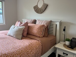 Master bedroom featuring king size bed, ensuite, smart TV and split system.