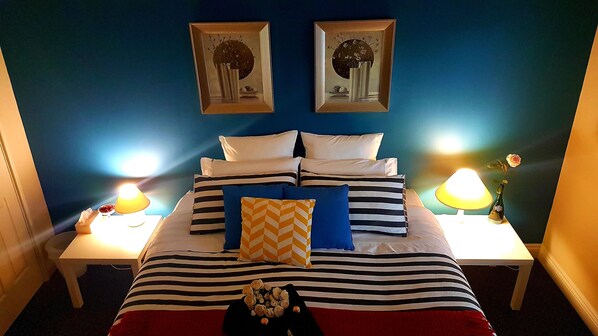 Luxury king size bed with private ensuite overlooking the garden. 