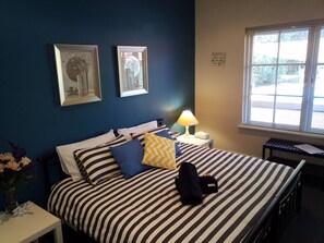 King size bed with natural light and fresh air...