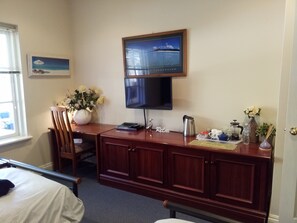 TV, DVD player, study desk overlooking the garden. 