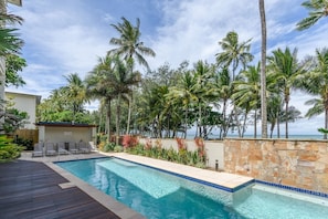 Soak up the sun outside, making use of the building's shared beachfront pool.