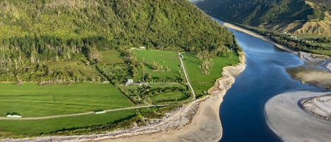 The Riverview Home is the building at the top of this photograph at the bush edge