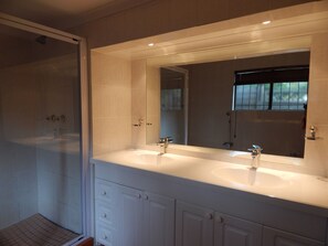 Twin vanities in Unit 1 bathroom 