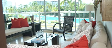 Living room with pool view