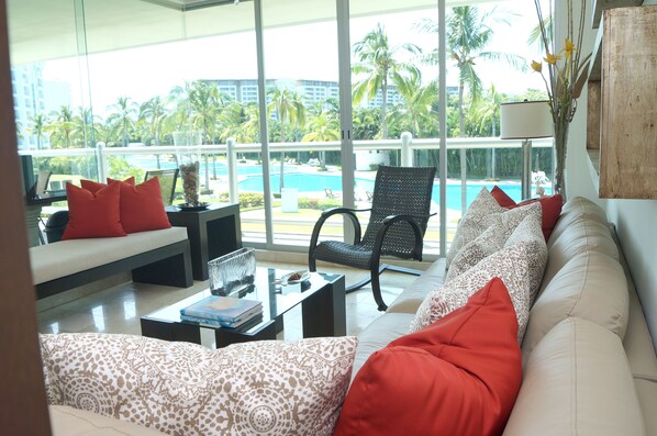 Living room with pool view