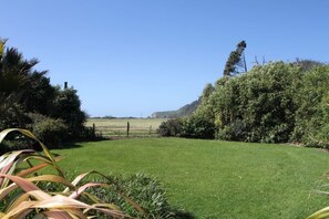 Lawn straight in front of the Treehouse - with view north to Gentle Annie Point 