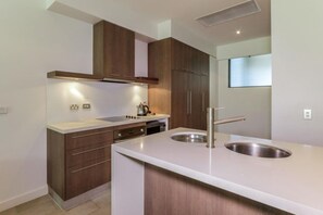 The generous size kitchen is fully equipped with everything you could need to whip up a delicious meal.
