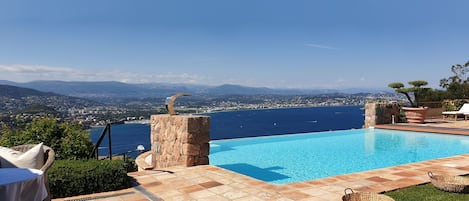 10 x 5 mtr heated infinity pool overseeing the Cannes bay 180 degree .