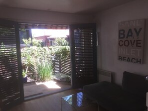 View from second bedroom/second loungeroom into our courtyard.