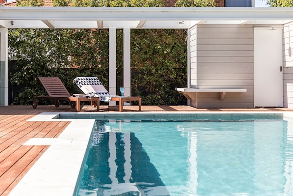 the shimmering outdoor pool