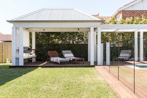 the outdoor bbq area and entertaining area