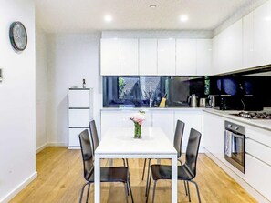 Spacious Dining Area and Modern Kitchen