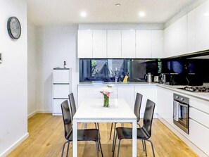 Spacious dining area and modern kitchen