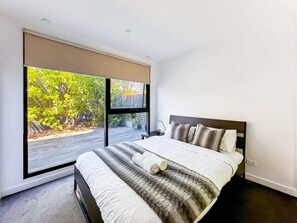 second bedroom with garden view