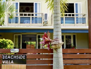 this modern two level villa is super popular and steps to Muri Beach & lagoon