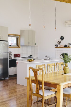 Well equiped kitchen and dining, with beautiful water views
