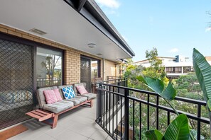 Listen to the birds on the private balcony with district views...