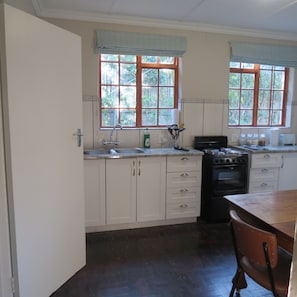 Fully equipped kitchen and table to work at