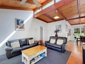 Luxury lounging: Living room adorned with sumptuous leather couches.