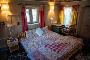 Where earth meets comfort — sleep softly in our handcrafted mud bedroom