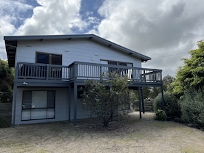 Front of house with off street parking for 3 cars