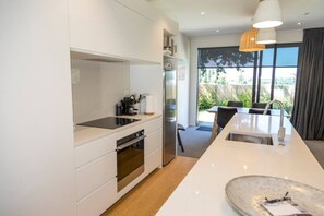 kitchenModern and clean. Close to amenities. Suits business and leisure travellers. Close to supermarket, great kitchen and even Nespresso machine! Best stay ever!