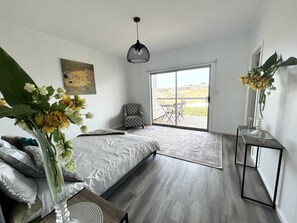 Master bedroom with private balcony and great views