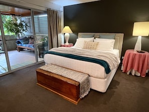 The main bedroom has a king size bed, luxury linens and large ensuite bath 