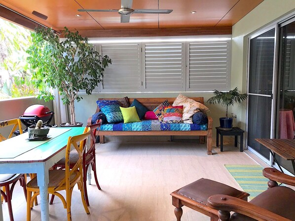 Relax or dine on the covered balcony