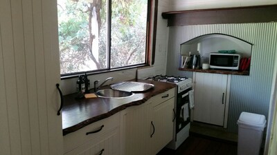 Artfully restored stand alone  timber cottage on 1/4 acre in the Perth hills