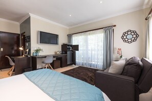 Watch bouquet of channels on large TV from bed, couch and patio..convenient