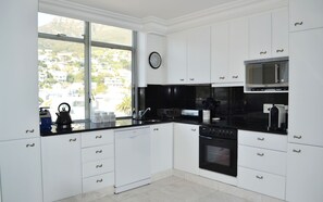 The kitchen over looking Table Mountain and Lions Head.