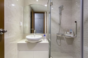 A Nicely Clean Sink And A Shower Room