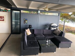 Comfortable outdoor seating  adjacent to the BBQ & outdoor/indoor dinign spaces.