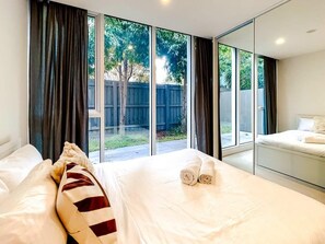 second bedroom with garden view