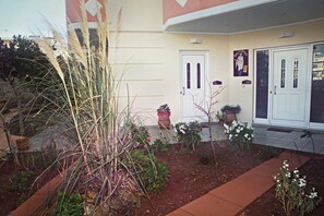 Garden & Apts Facade.	