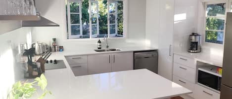 Freshly renovated kitchen - fridge, oven, stove, microwave 