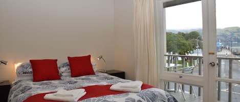 Master bedroom with queen bed, walk onto the deck and enjoy the stunning views