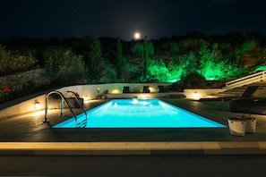 Private pool by night