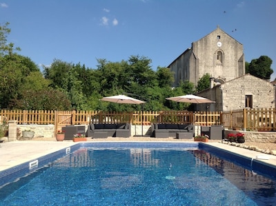 Farmhouse with heated pool & games barn.  in village with shop, bar and chateau.