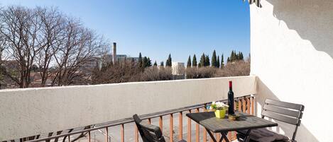 Sunny balcony where you can enjoy your morning coffee!