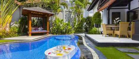 Awesome sparkling pool featuring delicious floating breakfast