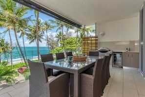 Take in the breathtaking beach views from the inviting patio.