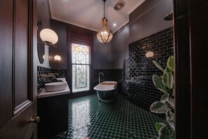 Award winning bathroom with floor heating and refurbished original claw foot