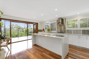 Modern, top of the range appliances in the large open kitchen